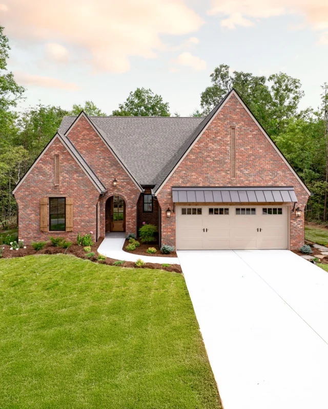 A well-designed exterior is all about balance, and this home nails it. ⚖️ Old Jackson brick provides a warm, welcoming backdrop, while every detail works together to enhance the overall curb appeal. For a subtle, traditional exterior like this, complementary selections are key.🔑 Here, the wood shutters add natural texture, playing off the earthy brick tones, while the taupe trim and garage door keep the palette cohesive. 

On the other hand, if you prefer something bolder or more modern, high-contrast accents may be worth considering! Either way, always be sure to sample your selections together on-site to see how they work together in natural light! 🎨☀️

Have questions? Drop them in today’s Design Q&A on our stories!💬 Or check out our blog to find more exterior design and material selection tips. We’re here to help!

🧱Old Jackson Brick + Gray Mortar, Built by @zurichhomesfairfieldglade